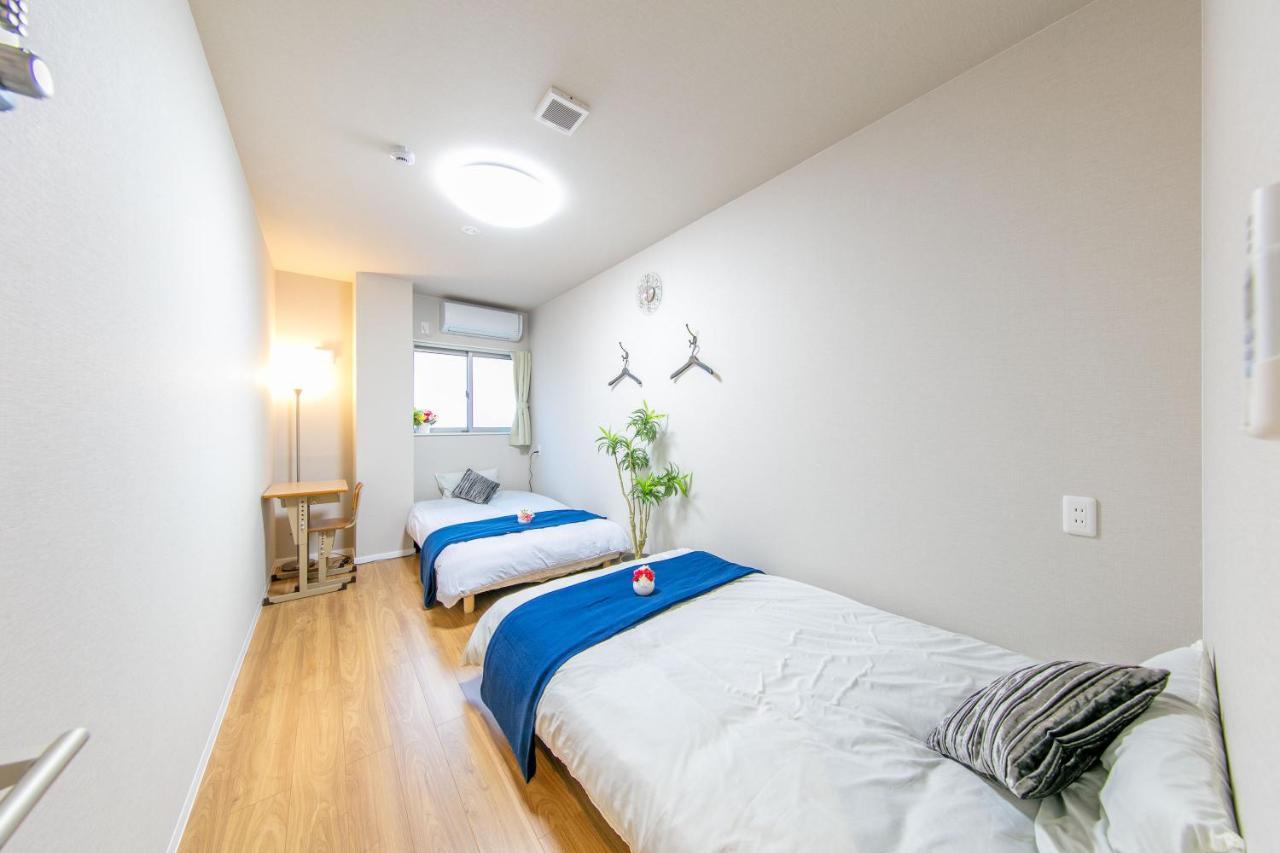 Guest House彩 Moriguchi Exteriör bild
